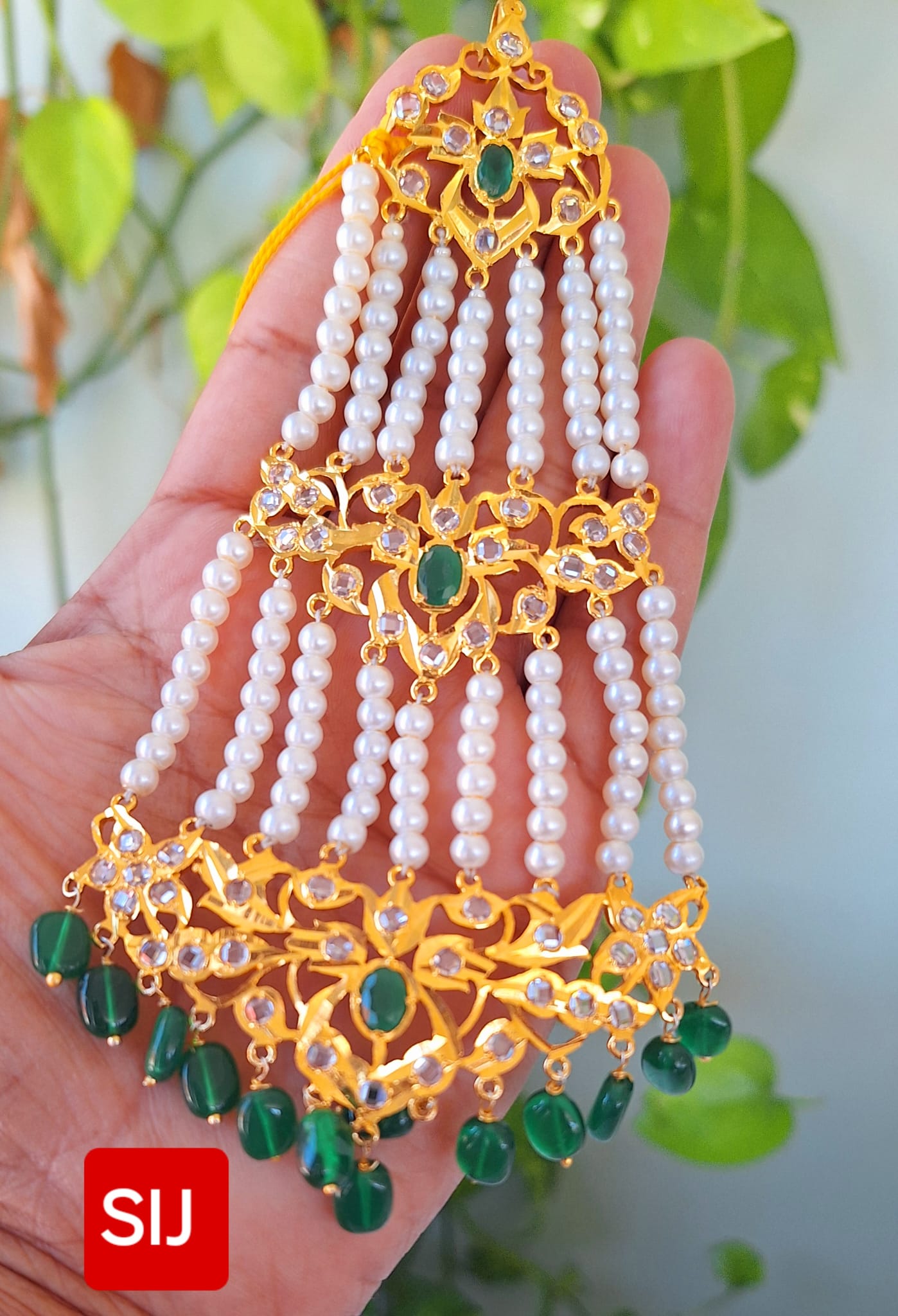 Nizaami Polki Jhumar/Pasa in shell Pearl’s Gold Plated