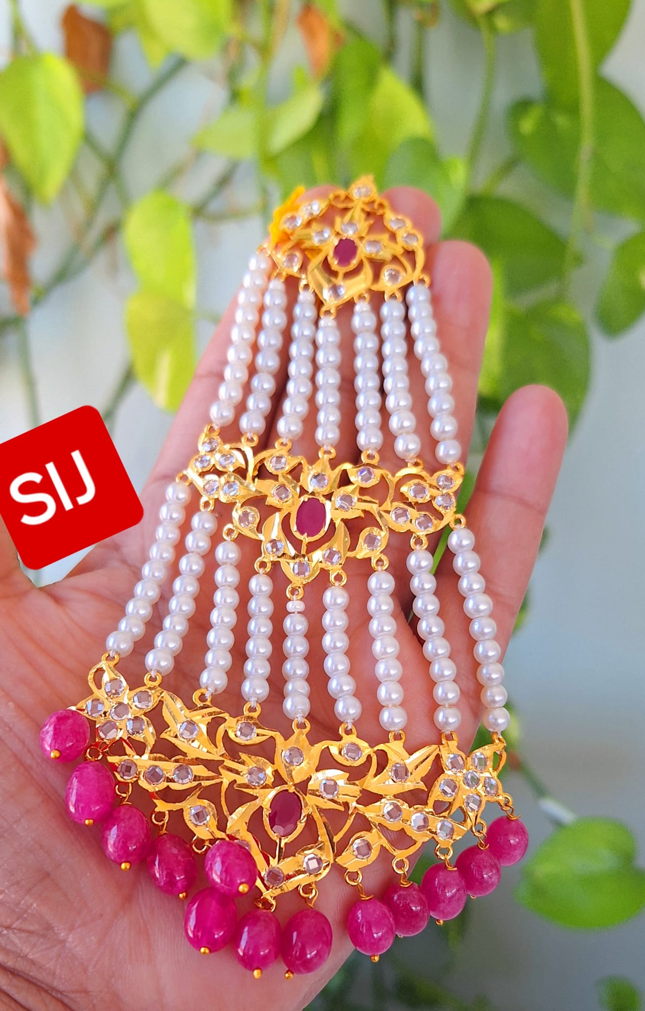 Nizaami Polki Jhumar/Pasa in shell Pearl’s Gold Plated